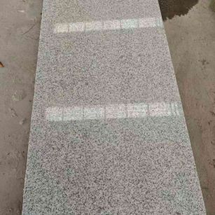 邯郸芝麻白光面毛板